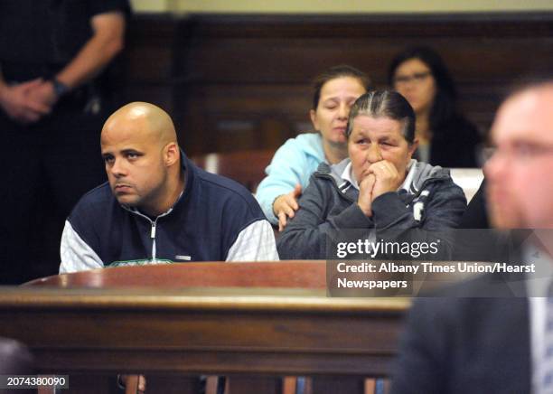 Family of Vanessa Milligan , Marcel Milligan , left, and Patricia Sunkes , right, listen during the bail hearing for Gabriel Vega, charged with the...