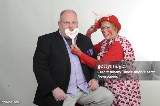 Ladybug the clown and Steve Barnes on Tuesday April 28, 2015 in Colonie, N.Y.