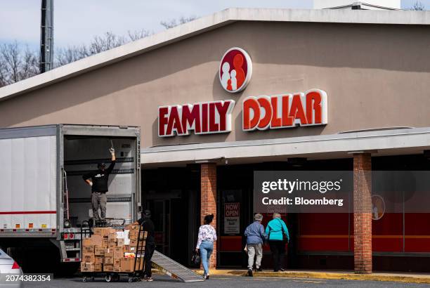 Shoppers walk past a delivery truck outside of a Family Dollar Stores Inc. Store in Hyattsville, Maryland, US, on Wednesday, March 13, 2024. Dollar...