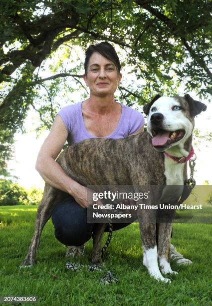 Staci Lawrence and her therapy dog Fiona on Tuesday Aug. 4, 2015 in Selkirk, N.Y.