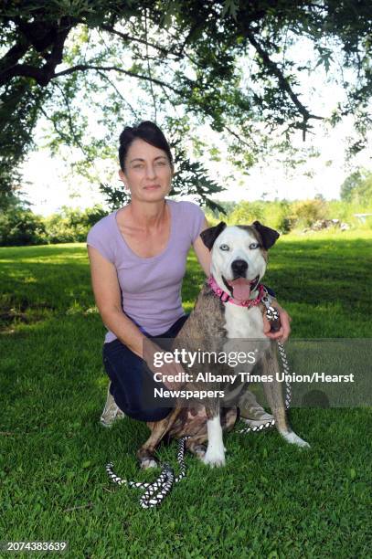 Staci Lawrence and her therapy dog Fiona on Tuesday Aug. 4, 2015 in Selkirk, N.Y.