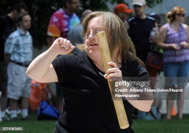 Debbie Woodruff a dancer with the band Flame, a group of talented musicians who happen to have disabilities, foolws the groove as they perform during...