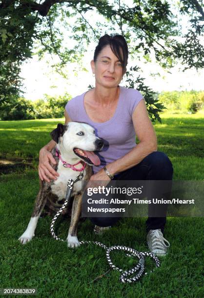 Staci Lawrence and her therapy dog Fiona on Tuesday Aug. 4, 2015 in Selkirk, N.Y.