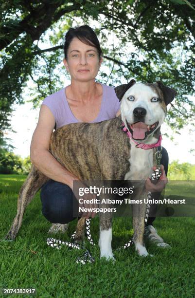 Staci Lawrence and her therapy dog Fiona on Tuesday Aug. 4, 2015 in Selkirk, N.Y.