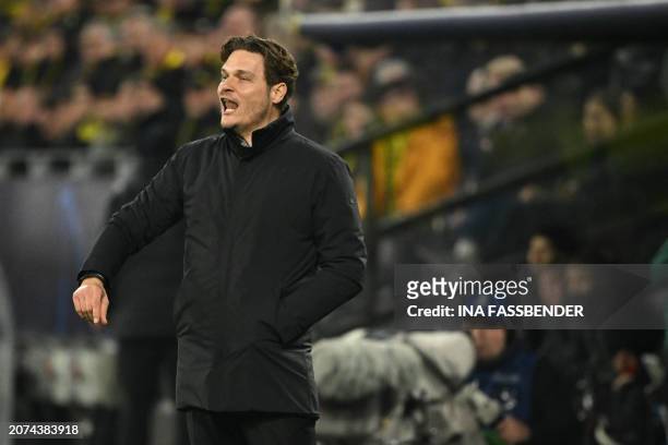 Dortmund's German head coach Edin Terzic celebrates from the sidelines after the opening 1-0 goal during the UEFA Champions League last 16,...