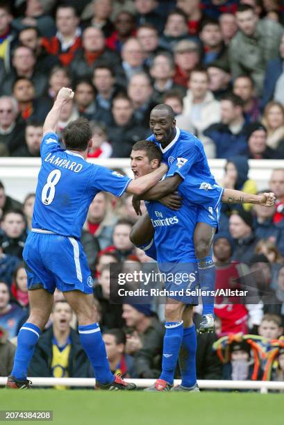 February 15: Adrian Mutu of Chelsea, Frank Lampard of Chelsea and Claude Makelele of Chelsea celebrate during the FA Cup 5th Round match between...