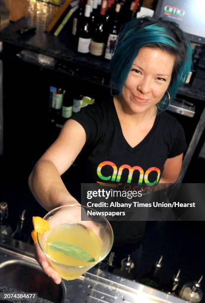 Bartender Amanda Houghtaling with her La Remolacha coctail at Ama Cocina on Thursday Oct. 22, 2015 in Albany, N.Y.