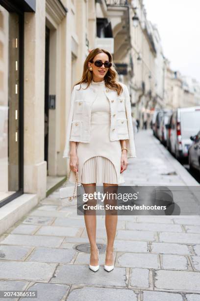 Alexandra Lapp is seen wearing a Mango tweed jacket in creme, a Karen Millen Military Tailored dress in cream, Celine Triomphe sunglasses in black,...