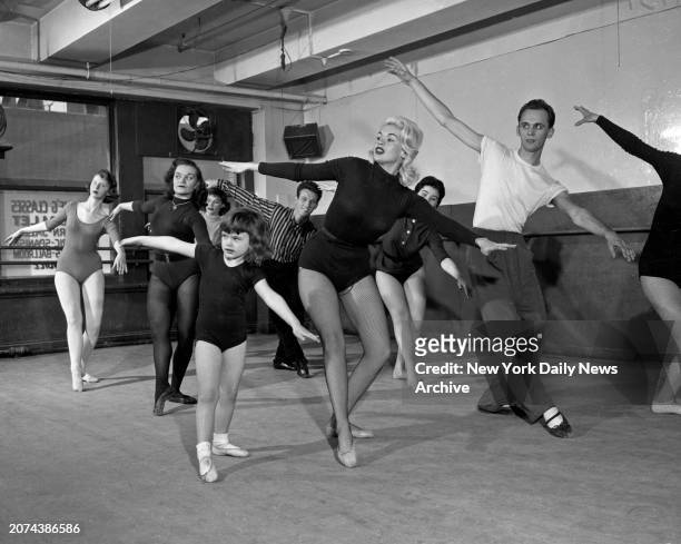 April 1: Jayne Marie joins her mother Jayne Mansfield at ballet school both attend regularly.