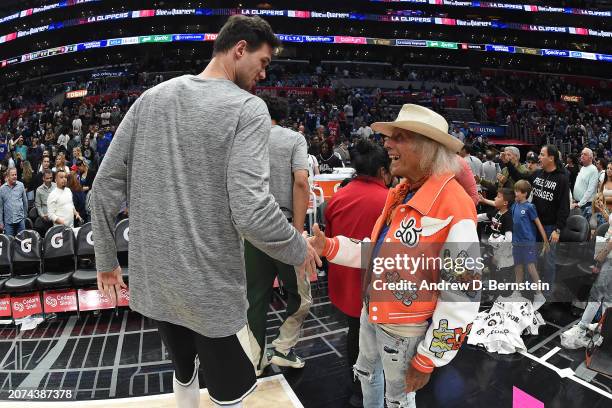 James Goldstein shakes hands with Danilo Gallinari of the Milwaukee Bucks during the game against the LA Clippers on March 10, 2024 at Crypto.Com...