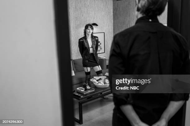 Episode 1498 -- Pictured: Actress Kristen Stewart talks with host Seth Meyers backstage on March 13, 2024 --