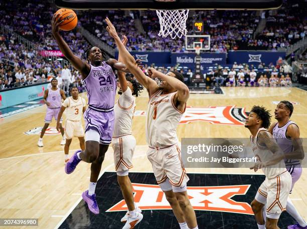 Arthur Kaluma of the Kansas State Wildcats goes up for a shot against the Texas Longhorns during the first half in the second round of the Big 12...