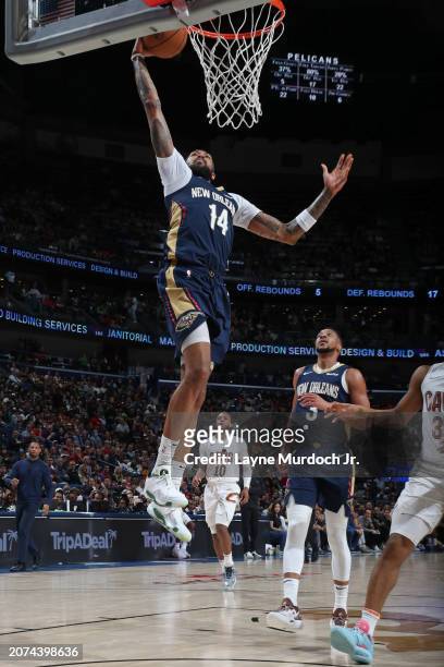 Brandon Ingram of the New Orleans Pelicans dunks the ball during the game against the Cleveland Cavaliers on March 13, 2024 at the Smoothie King...
