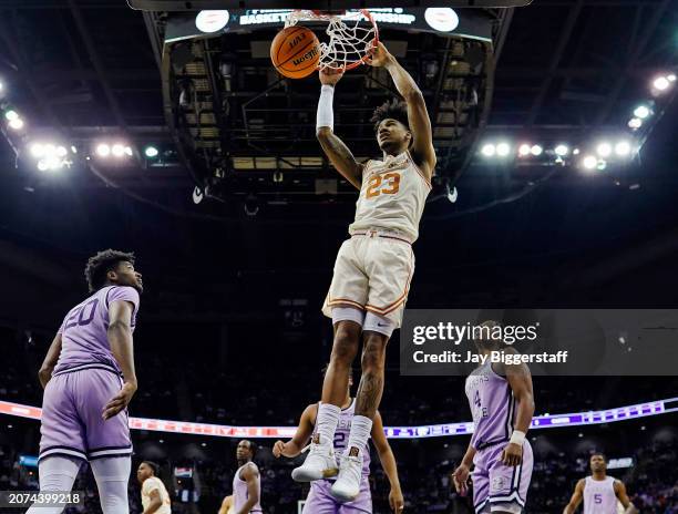 Dillon Mitchell of the Texas Longhorns dunks against the Kansas State Wildcats during the first half of the game in the second round of the Big 12...