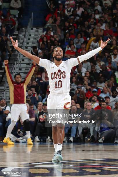 Darius Garland of the Cleveland Cavaliers celebrates three point basket during the game against the New Orleans Pelicans on March 13, 2024 at the...