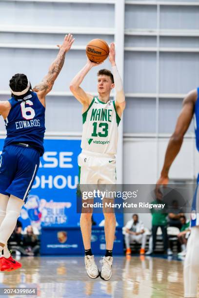 Drew Peterson of the Main Celtics shoots a three point basket during the game against the Delaware Blue Coats on March 13, 2024 at Chase Fieldhouse...