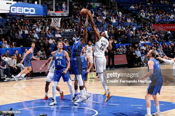 Nicolas Claxton of the Brooklyn Nets blocks the shot during the game against the Orlando Magic on March 13, 2024 at the Kia Center in Orlando,...