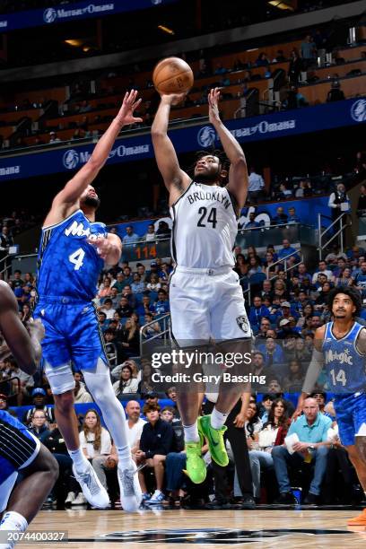 Cam Thomas of the Brooklyn Nets shoots the ball during the game against the Orlando Magic on March 13, 2024 at the Kia Center in Orlando, Florida....