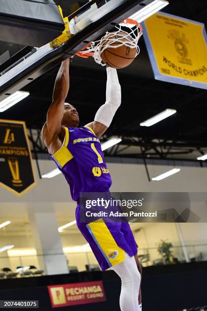 Shaquille Harrison of the South Bay Lakers dunks the basketball during the game against the Westchester Knicks on March 13, 2024 at UCLA Health...
