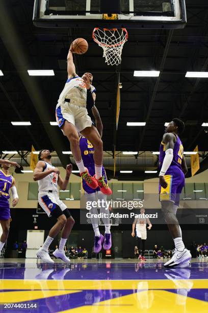 Jacob Toppin of the Westchester Knicks dunks the basketball during the game against the South Bay Lakers on March 13, 2024 at UCLA Health Training...