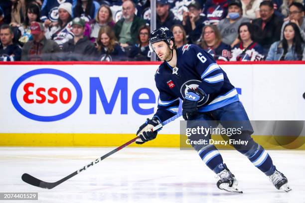 Colin Miller of the Winnipeg Jets follows the play up the ice during third period action against the Nashville Predators at the Canada Life Centre on...