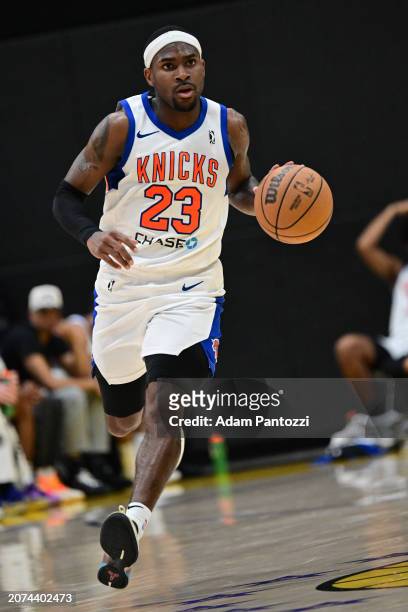 De'Vion Harmon of the Westchester Knicks handles the ball during the game against the South Bay Lakers on March 13, 2024 at UCLA Health Training...