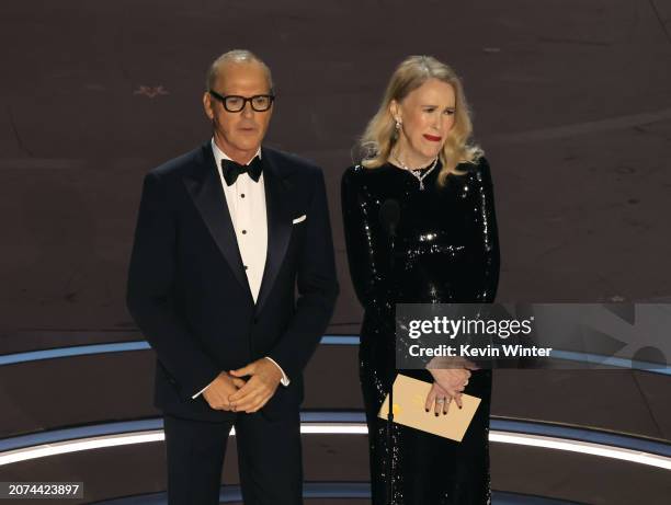 Michael Keaton and Catherine O'Hara speak onstage during the 96th Annual Academy Awards at Dolby Theatre on March 10, 2024 in Hollywood, California.
