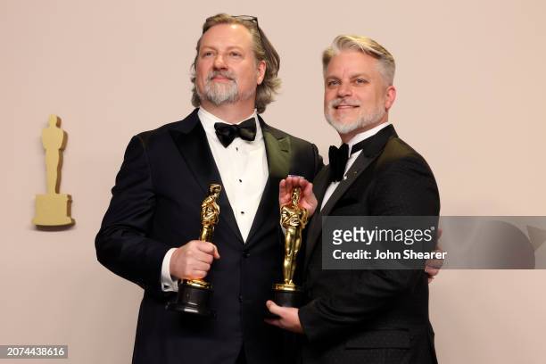 Dave Mullins and Brad Booker, winner of the Best Animated Short Film for “War is Over! Inspired by the Music of John & Yoko”, pose in the press room...