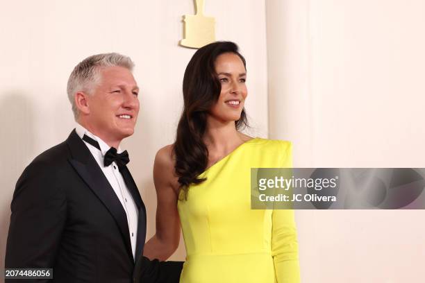 Bastian Schweinsteiger and Ana Ivanovic attend the 96th Annual Academy Awards on March 10, 2024 in Hollywood, California.