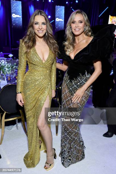 Elizabeth Hurley and Heidi Klum attend the Elton John AIDS Foundation's 32nd Annual Academy Awards Viewing Party on March 10, 2024 in West Hollywood,...