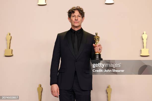 Director, Jonathan Glazer, winner of the Best International Feature for “The Zone of Interest”, poses in the press room during the 96th Annual...