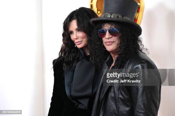 Meegan Hodges and Slash attend the 96th Annual Academy Awards at Dolby Theatre on March 10, 2024 in Hollywood, California.