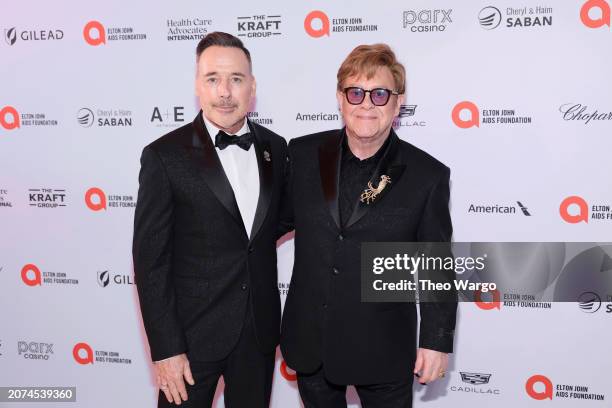 David Furnish and Elton John attend the Elton John AIDS Foundation's 32nd Annual Academy Awards Viewing Party on March 10, 2024 in West Hollywood,...