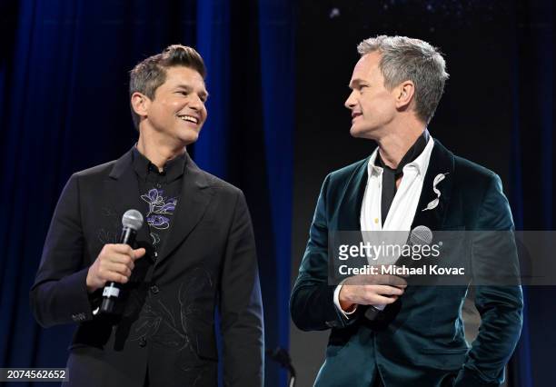 David Burtka and Neil Patrick speak on stage during the Elton John AIDS Foundation's 32nd Annual Academy Awards Viewing Party on March 10, 2024 in...