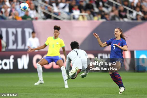 Luciana of Brazil clears the ball in front of Alex Morgan of the United States during the second half of the 2024 Concacaf W Gold Cup Final at...