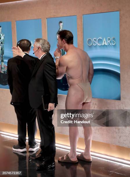 In this handout photo provided by A.M.P.A.S., John Cena is seen backstage during the 96th Annual Academy Awards at Dolby Theatre on March 10, 2024 in...