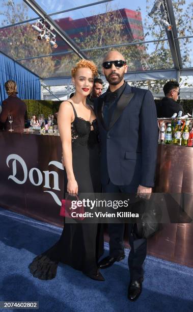 Nathalie Emmanuel and Alex Lanipekun attend Elton John AIDS foundation annual viewing party With Tequila Don Julio at West Hollywood Park on March...