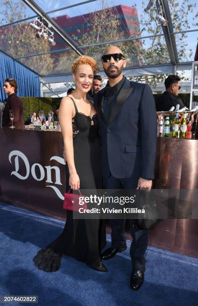 Nathalie Emmanuel and Alex Lanipekun attend Elton John AIDS foundation annual viewing party With Tequila Don Julio at West Hollywood Park on March...