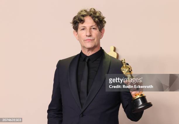 Jonathan Glazer, winner of the Best International Feature Film award for 'The Zone of Interest,' poses in the press room during the 96th Annual...