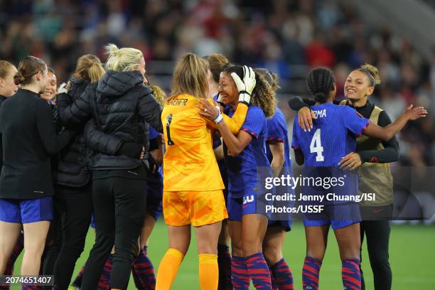 United States players including Alyssa Naeher and Lynn Williams celebrate defeating Brazil during the 2024 Concacaf W Gold Cup final at Snapdragon...