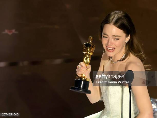 Emma Stone accepts the Best Actress in a Leading Role award for "Poor Things" onstage during the 96th Annual Academy Awards at Dolby Theatre on March...