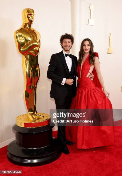 Juanpa Zurita and Macarena Achaga attend the 96th Annual Academy Awards on March 10, 2024 in Hollywood, California.