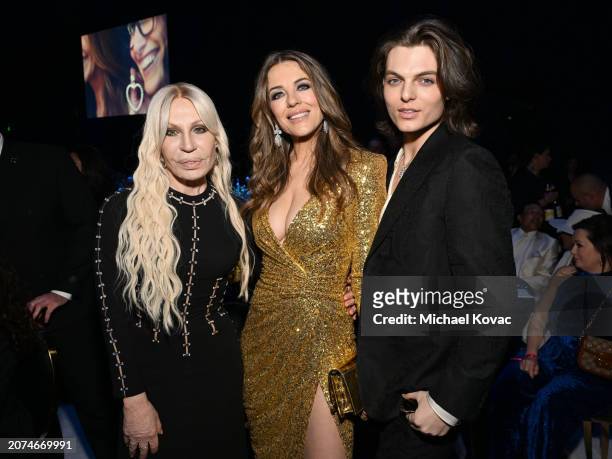 Donatella Versace, Elizabeth Hurley, and Damian Hurley attend the Elton John AIDS Foundation's 32nd Annual Academy Awards Viewing Party on March 10,...