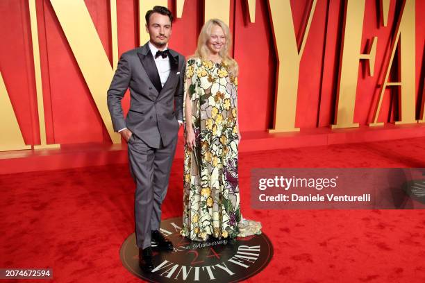 Brandon Thomas Lee and Pamela Anderson attend the 2024 Vanity Fair Oscar Party Hosted By Radhika Jones at Wallis Annenberg Center for the Performing...