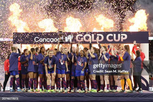 United States players celebrate after receiving the trophy for winning the 2024 Concacaf W Gold Cup Final against Brazil at Snapdragon Stadium on...