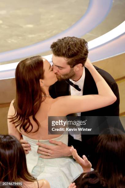 Emma Stone and Dave McCary kiss as she is announced Lead Actress award winner for "Poor Things" during the 96th Annual Academy Awards at Dolby...