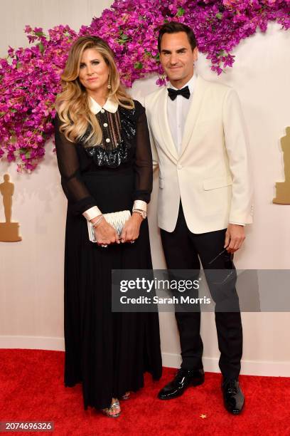 Mirka Federer and Roger Federer attend the 96th Annual Academy Awards on March 10, 2024 in Hollywood, California.