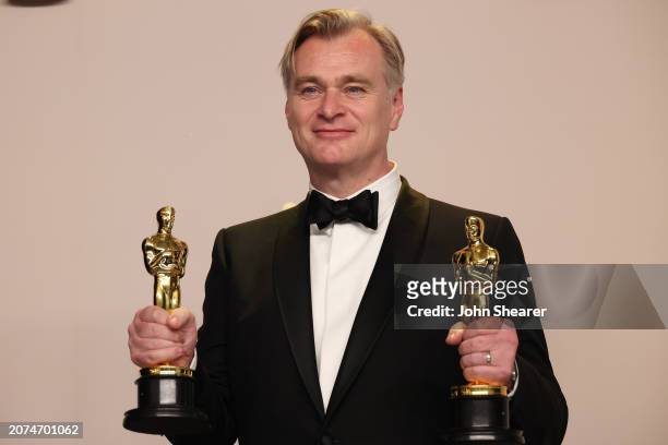 Christopher Nolan, winner of the Best Picture award for “Oppenheimer”, poses in the press room during the 96th Annual Academy Awards at Ovation...