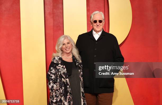 Callie Khouri and T Bone Burnett attend the 2024 Vanity Fair Oscar Party Hosted By Radhika Jones at Wallis Annenberg Center for the Performing Arts...