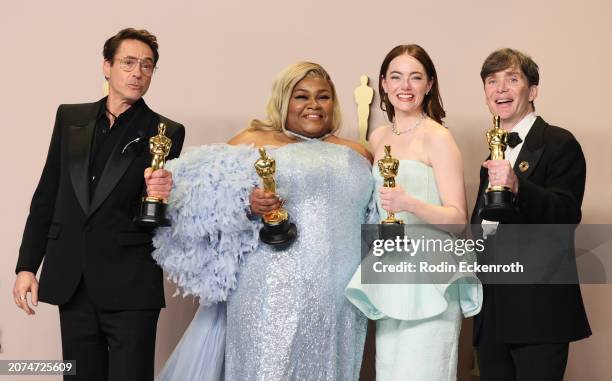 Robert Downey Jr., Da'Vine Joy Randolph, Emma Stone, and Cillian Murphy pose in the press room during the 96th Annual Academy Awards at Ovation...